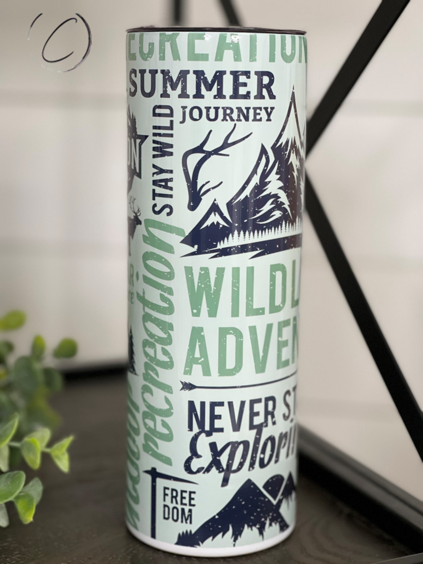 Outdoor Adventures 20oz Skinny Tumbler with vibrant design, reusable straw, and durable construction, perfect for outdoor activities.