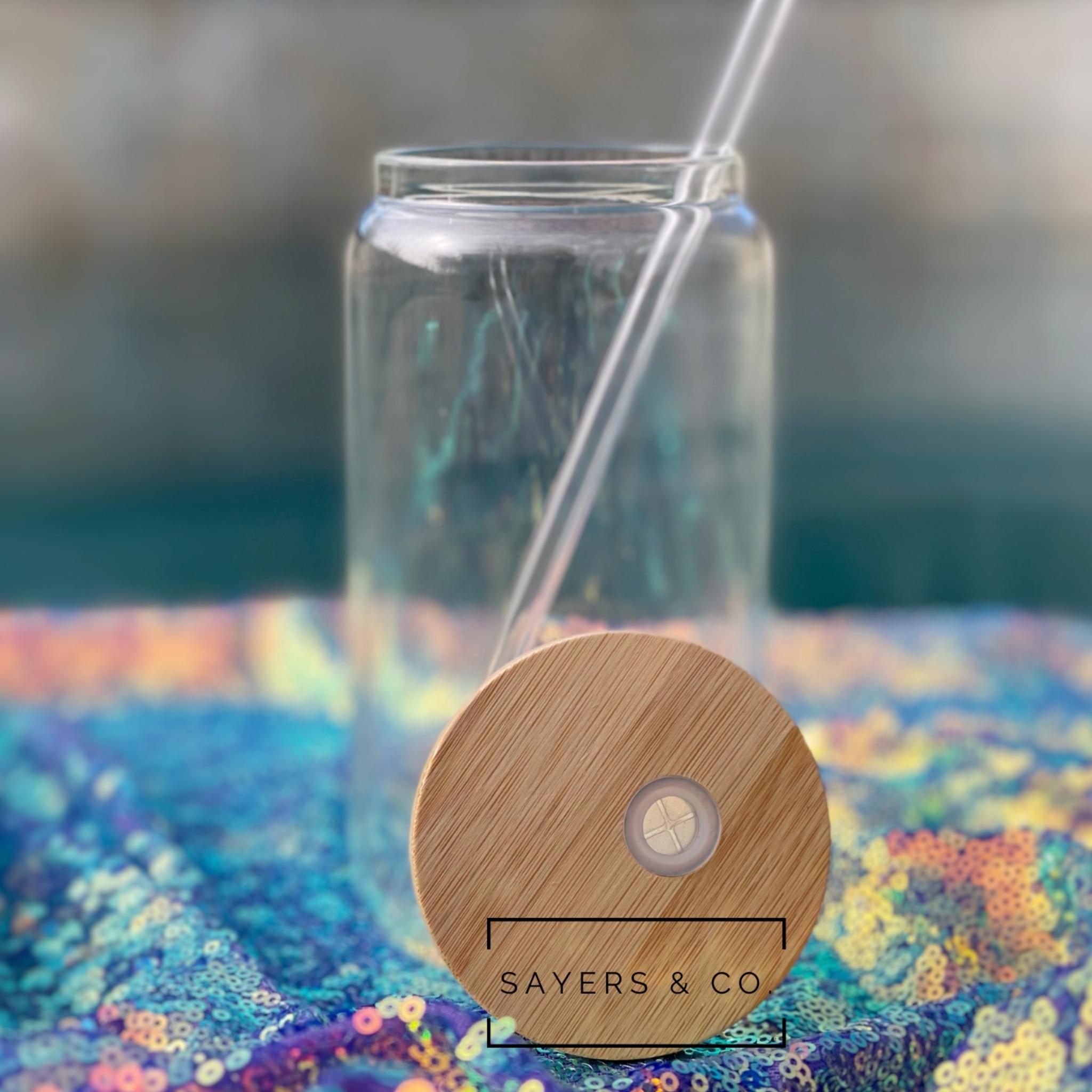 Pack of 10 sublimation glass cans with bamboo lids and straws, showcasing their clear design and eco-friendly features.