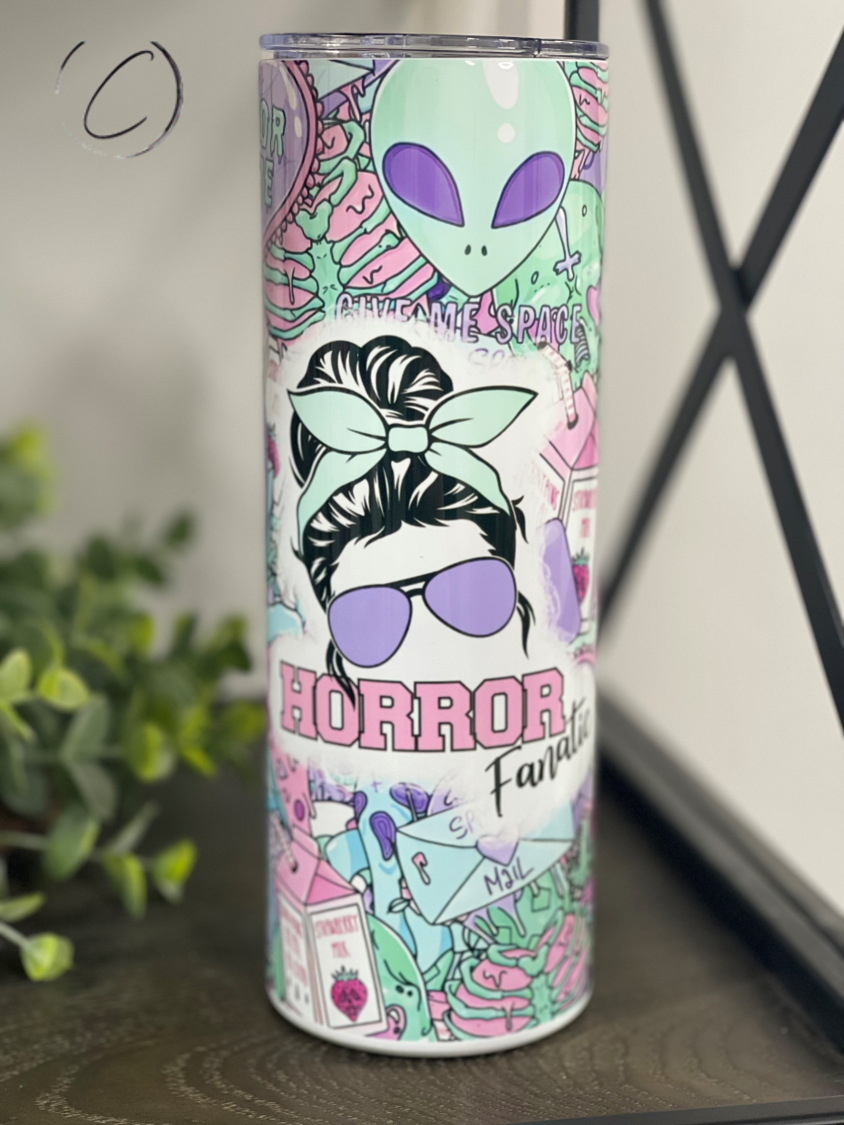 Pastel Horror Fanatic 20oz Skinny Tumbler featuring a unique pastel horror design, complete with a reusable straw.