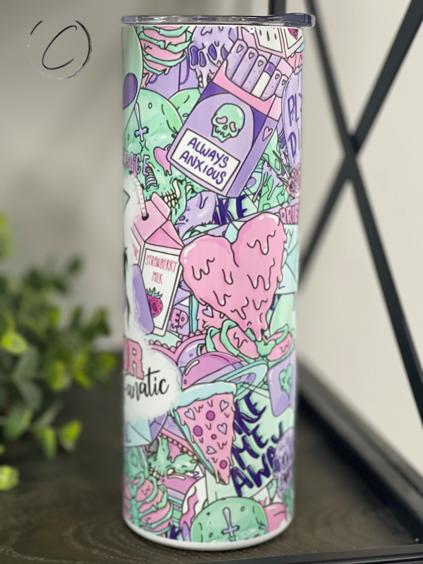 Pastel Horror Fanatic 20oz Skinny Tumbler featuring a unique pastel horror design, complete with a reusable straw.