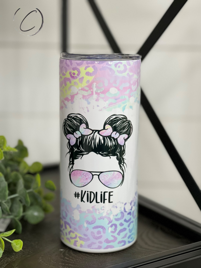 Pastel Leopard Messy Bun Kids Skinny Tumbler with straw, featuring a vibrant full wrap design.