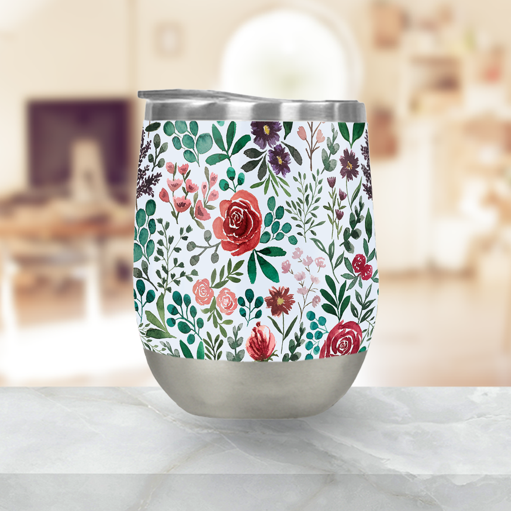 A stylish Pink and Purple Flowers Stemless Wine Tumbler made of stainless steel, featuring a floral design and a plastic lid.