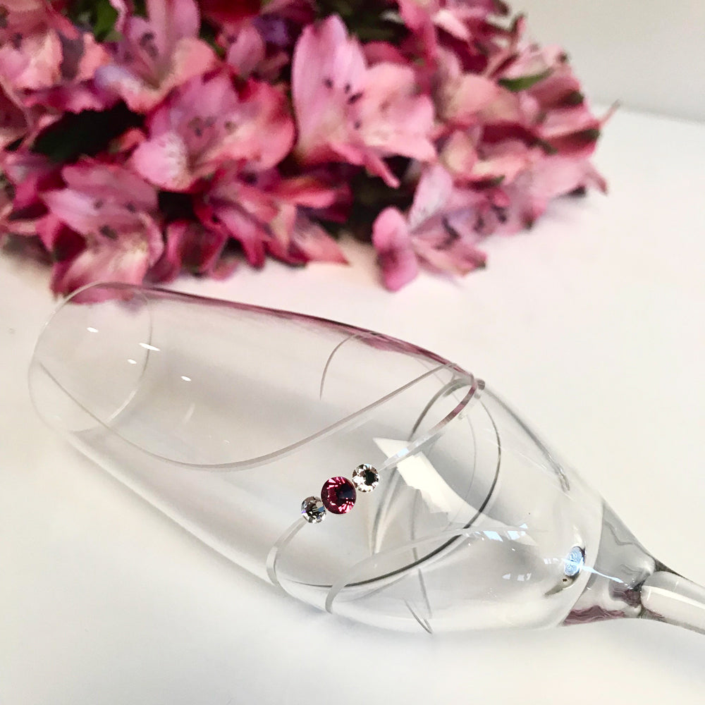 Set of 2 Pink Ribbon Champagne Glasses with Swarovski crystals in a gift box, showcasing elegant handcrafted design.
