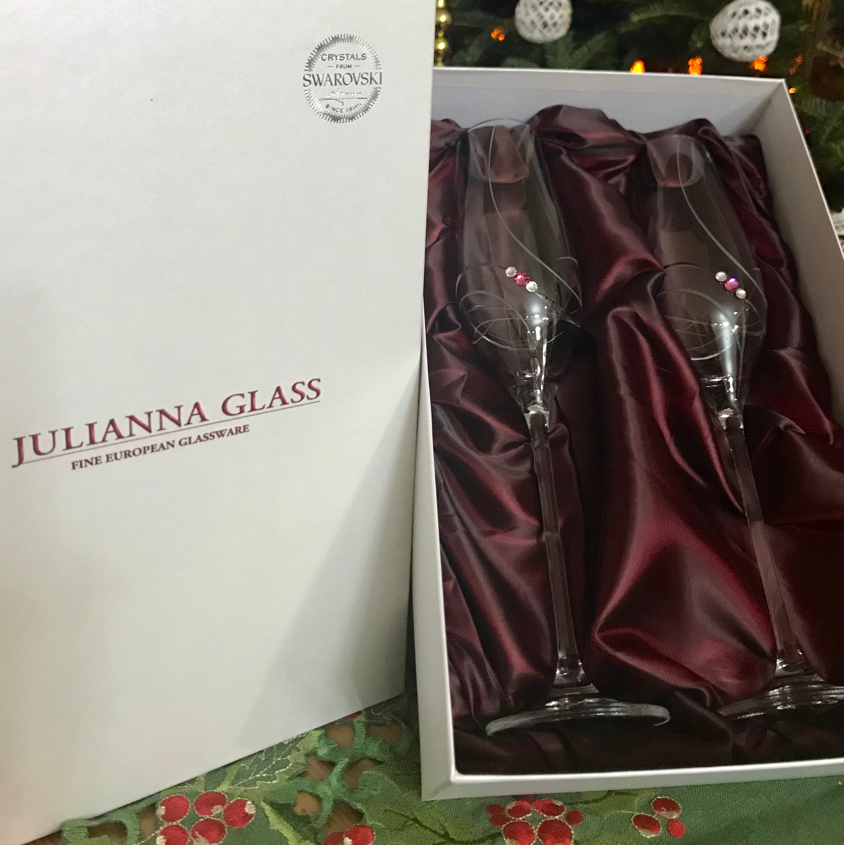 Set of 2 Pink Ribbon Champagne Glasses with Swarovski crystals in a gift box, showcasing elegant handcrafted design.