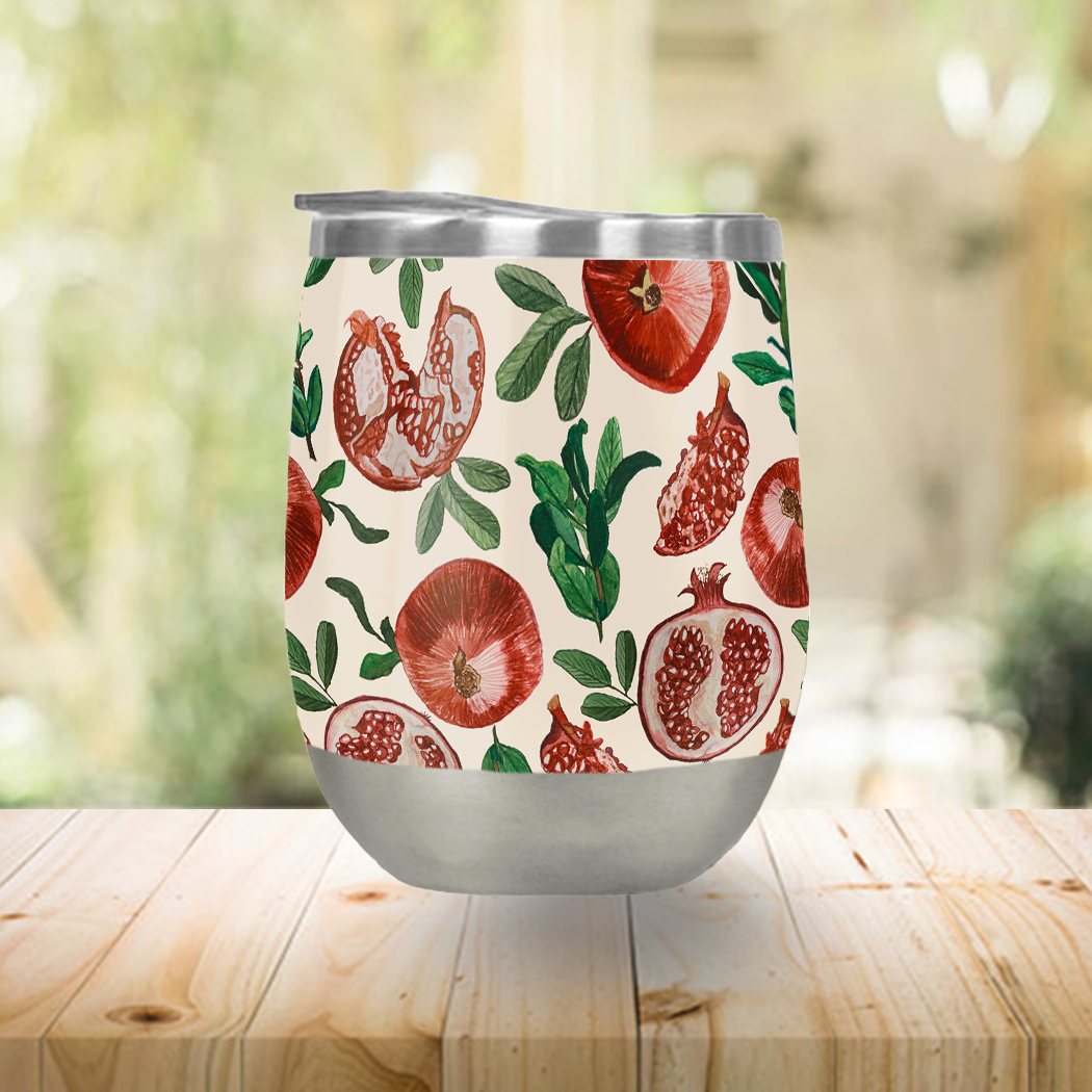 A stylish pomegranate-colored wine tumbler made of stainless steel, featuring a double-wall design and a secure plastic lid, perfect for outdoor use.