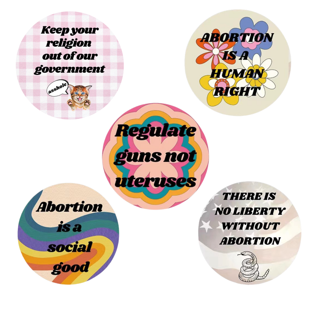 A set of five colorful 1.25 inch pinback buttons with pro-choice messages, perfect for feminists and advocates of reproductive rights.