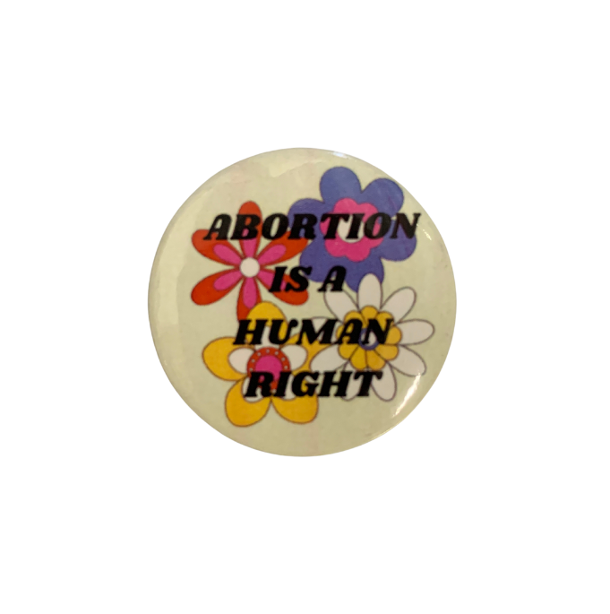 A set of five colorful 1.25 inch pinback buttons with pro-choice messages, perfect for feminists and advocates of reproductive rights.