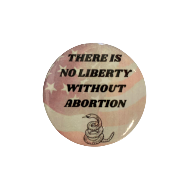A set of five colorful 1.25 inch pinback buttons with pro-choice messages, perfect for feminists and advocates of reproductive rights.