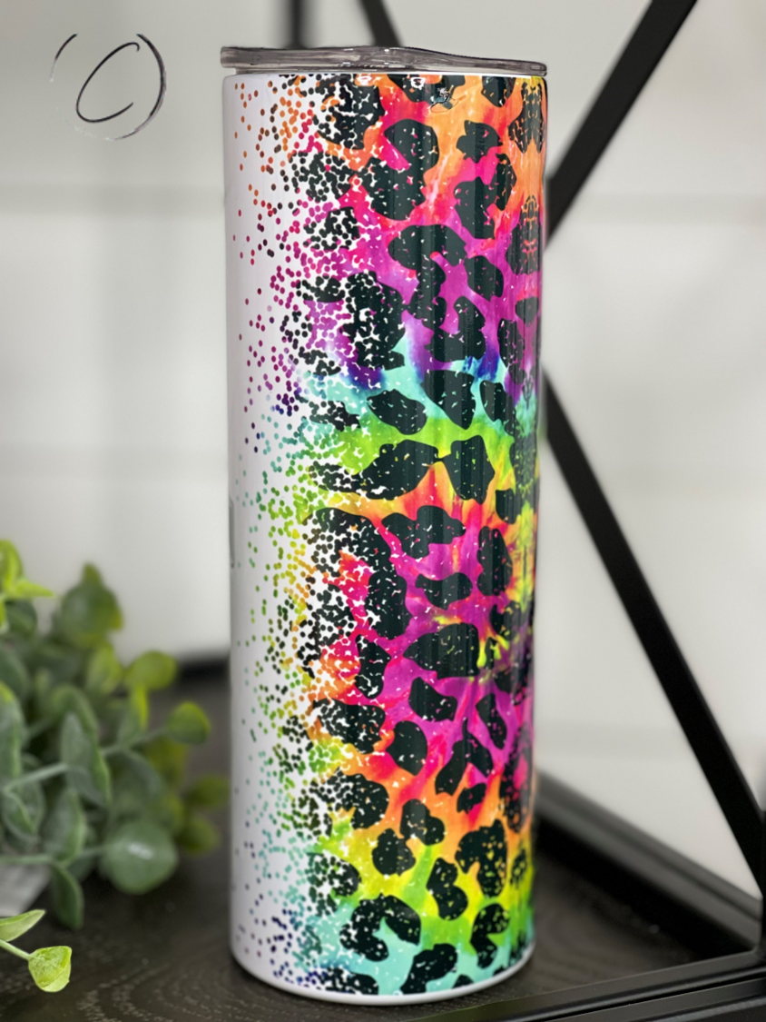 Rainbow Leopard Mama Rocks 20oz Skinny Tumbler with vibrant design and reusable straw.