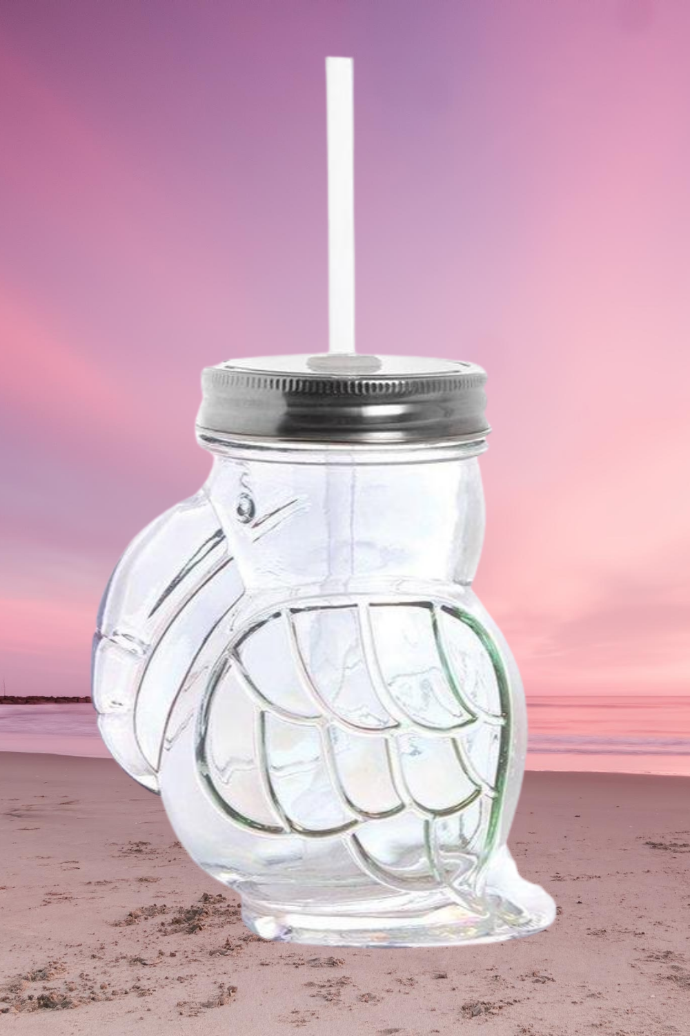 Rainbow Toucan Shaped Sipper made of iridescent glass, featuring a colorful toucan design with a lid and straw.