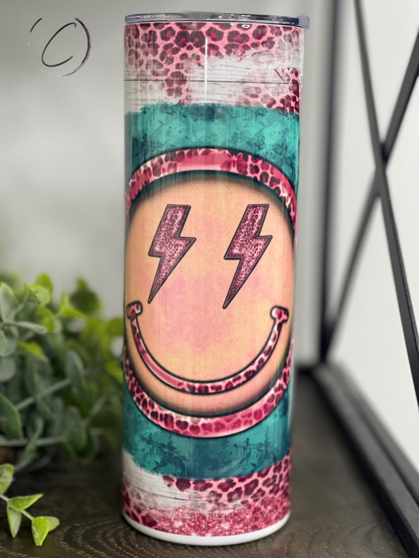 Rockin' Leopard Emoji 20oz Skinny Tumbler with vibrant leopard pattern and reusable straw.