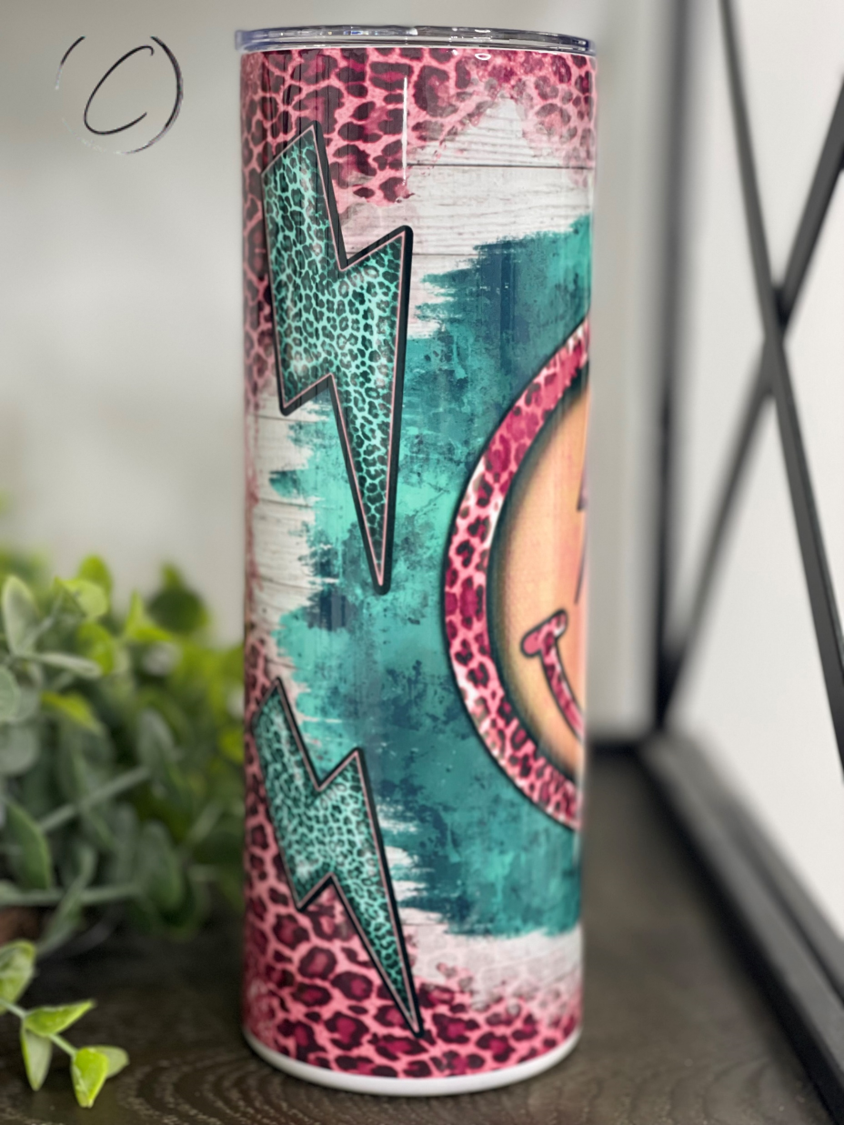 Rockin' Leopard Emoji 20oz Skinny Tumbler with vibrant leopard pattern and reusable straw.