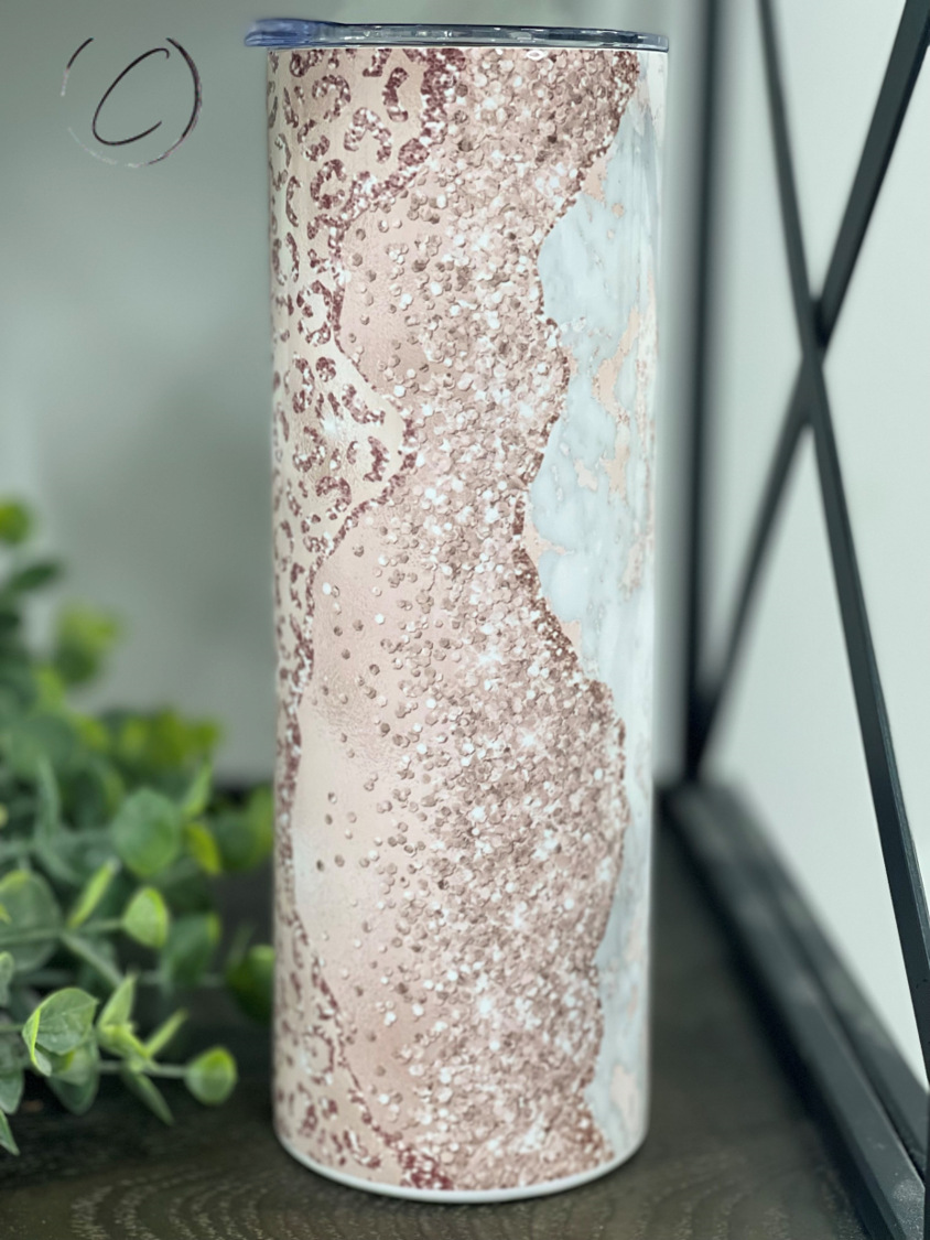 Rose Gold Leopard Geode 20oz Skinny Tumbler with reusable straw and unique design.