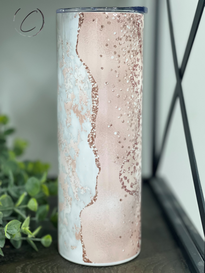 Rose Gold Leopard Geode 20oz Skinny Tumbler with reusable straw and unique design.