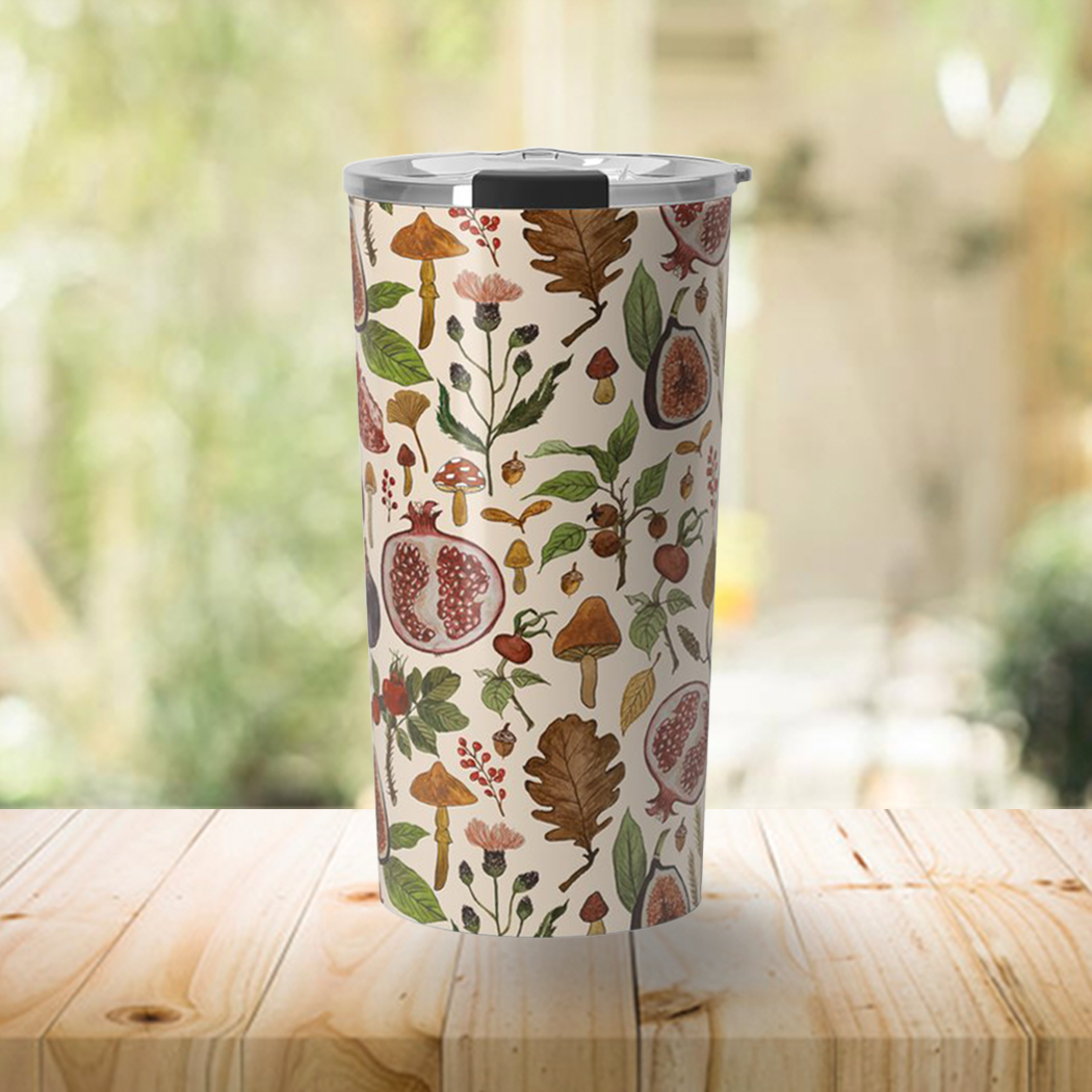 A stylish 20oz travel mug featuring rose hips, fruits, and leaves design, made of durable stainless steel with a double-wall insulation.