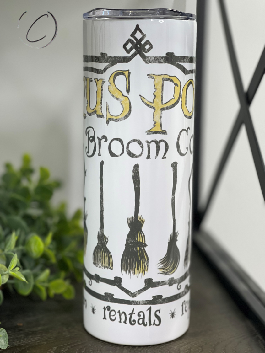 Salem Broom Co. 20oz Skinny Tumbler featuring a vibrant design, reusable straw, and sleek shape for easy handling.