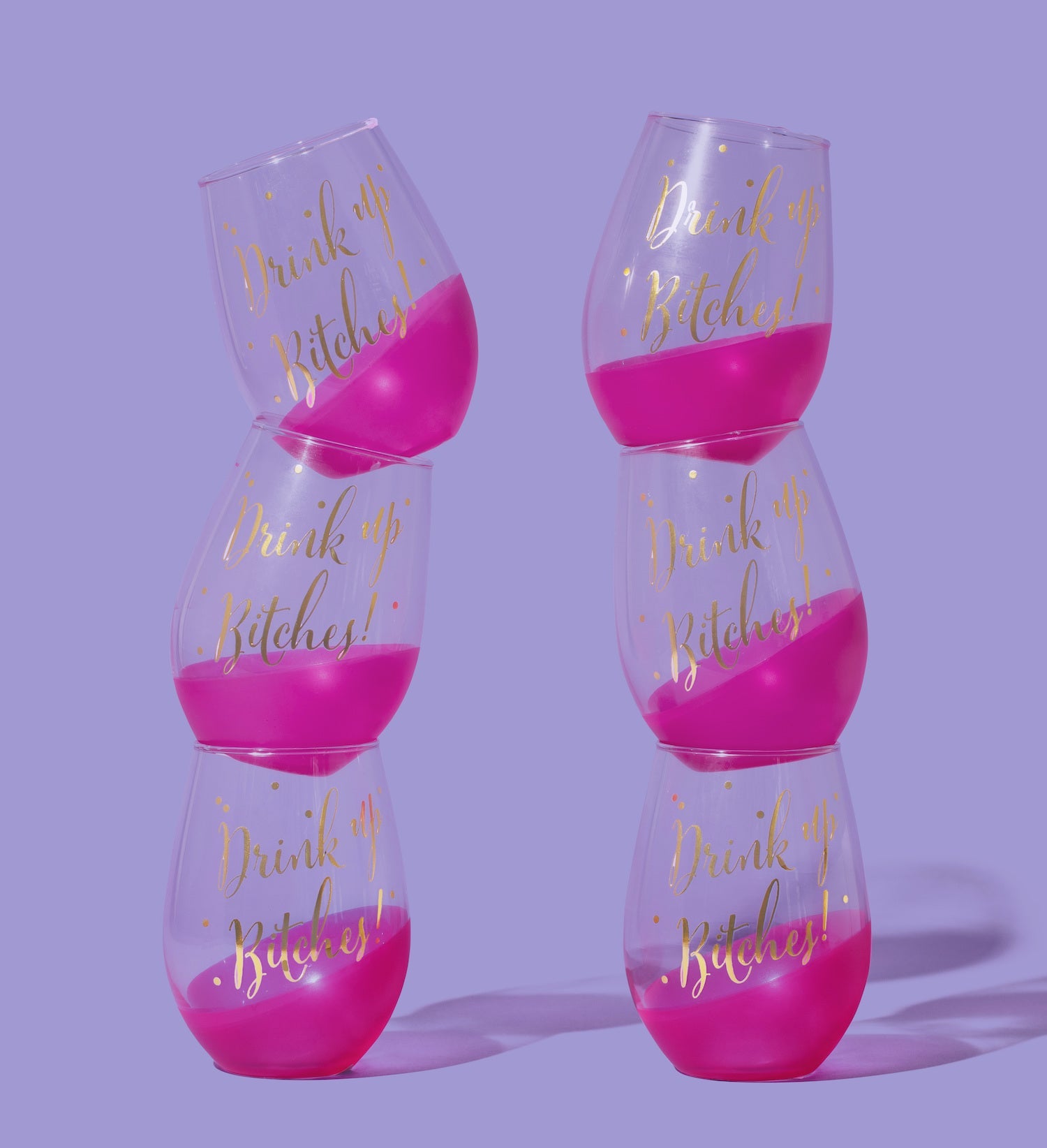Set of 6 stemless wine glasses with gold lettering and playful design, perfect for parties and gatherings.