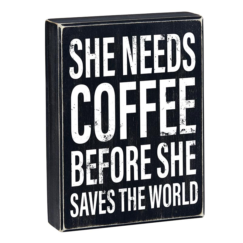Wooden decor box sign with the phrase 'She Needs Coffee Before She Saves The World', featuring a stylish design suitable for home decor.