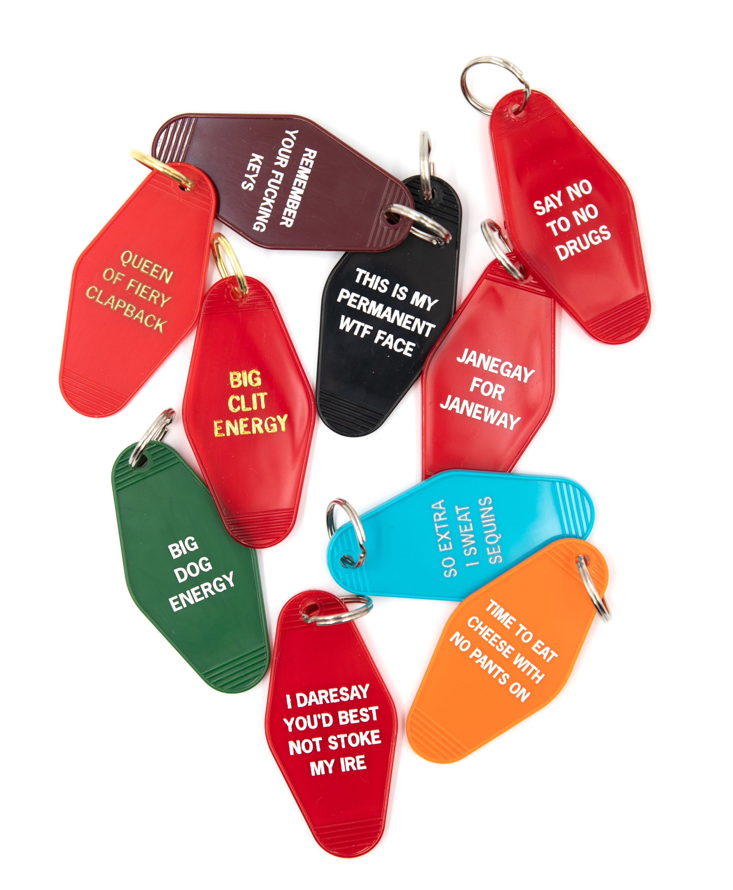 Aqua motel-style keychain with white lettering saying 'SO EXTRA I SWEAT SEQUINS', featuring a split ring for easy attachment.