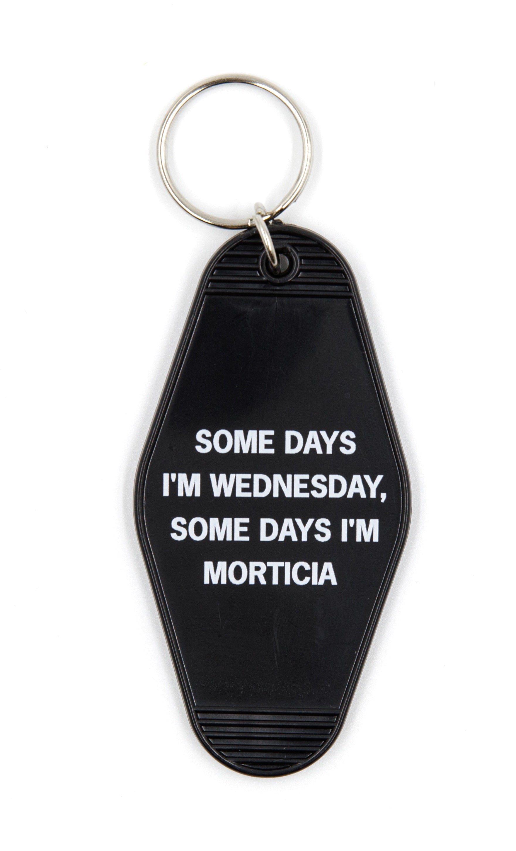 Black motel-style keychain with white lettering reading 'Some Days I'm Wednesday, Some Days I'm Morticia', featuring a split ring.