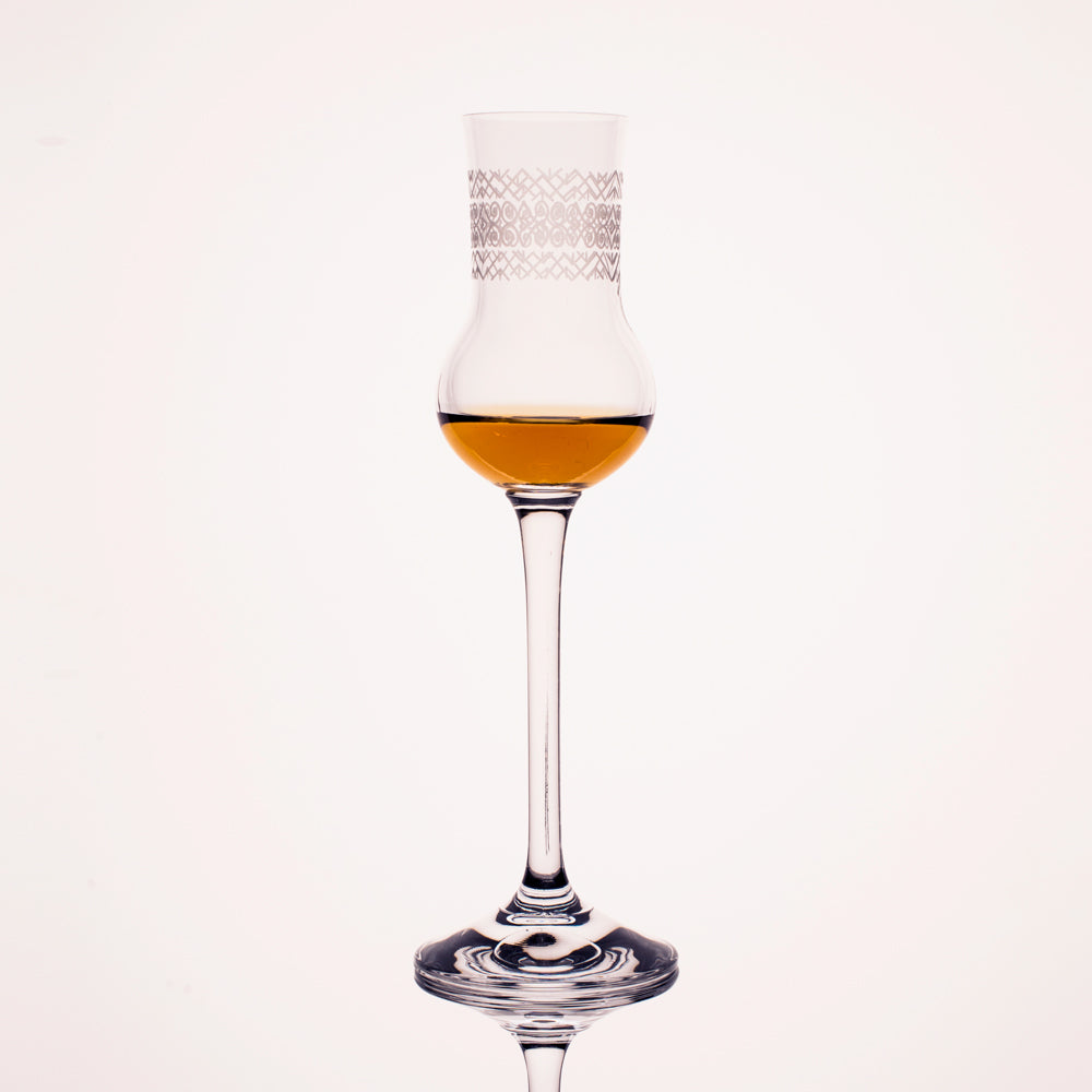 Set of 6 Spirits Glasses in an elegant gift box, showcasing their tall, flute-shaped design for optimal aroma and taste enhancement.