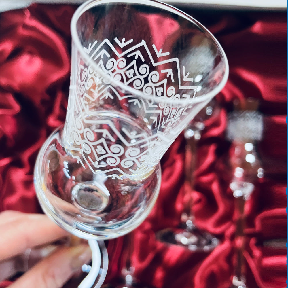 Set of 6 Spirits Glasses in an elegant gift box, showcasing their tall, flute-shaped design for optimal aroma and taste enhancement.