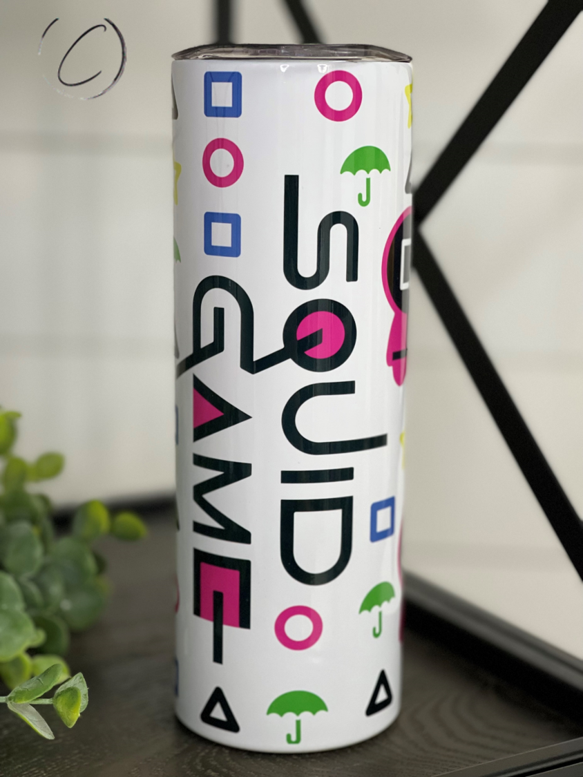 Squid Game 20oz skinny tumbler featuring vibrant full wrap design and reusable straw.
