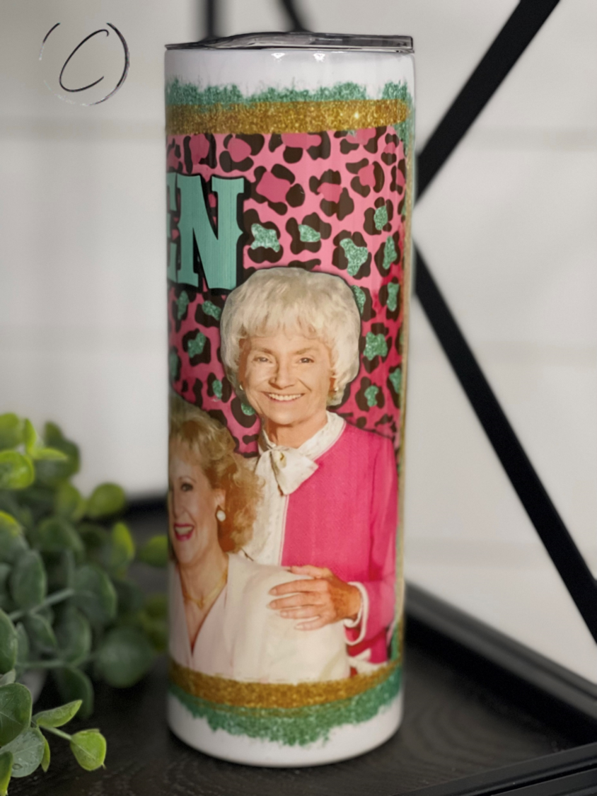 Stay Golden 20oz Skinny Tumbler with a stylish design, perfect for hot and cold drinks, featuring a reusable straw.