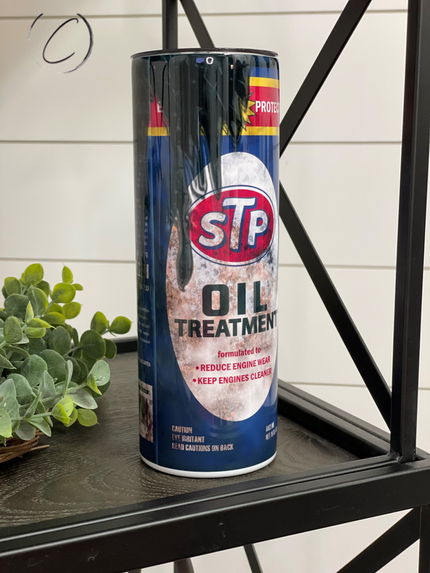 STP Oil Treatment 20oz Skinny Tumbler with vibrant full wrap design and reusable straw.