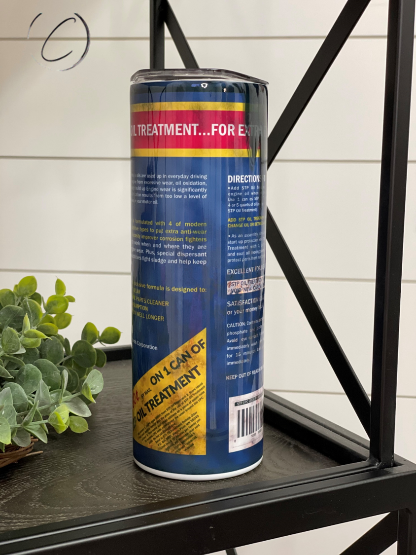 STP Oil Treatment 20oz Skinny Tumbler with vibrant full wrap design and reusable straw.