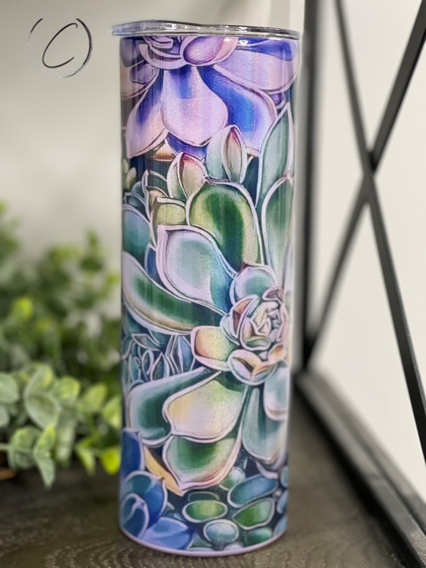 A 20oz Shimmer Skinny Tumbler featuring a vibrant succulent design with a rainbow shimmer effect, perfect for stylish hydration.