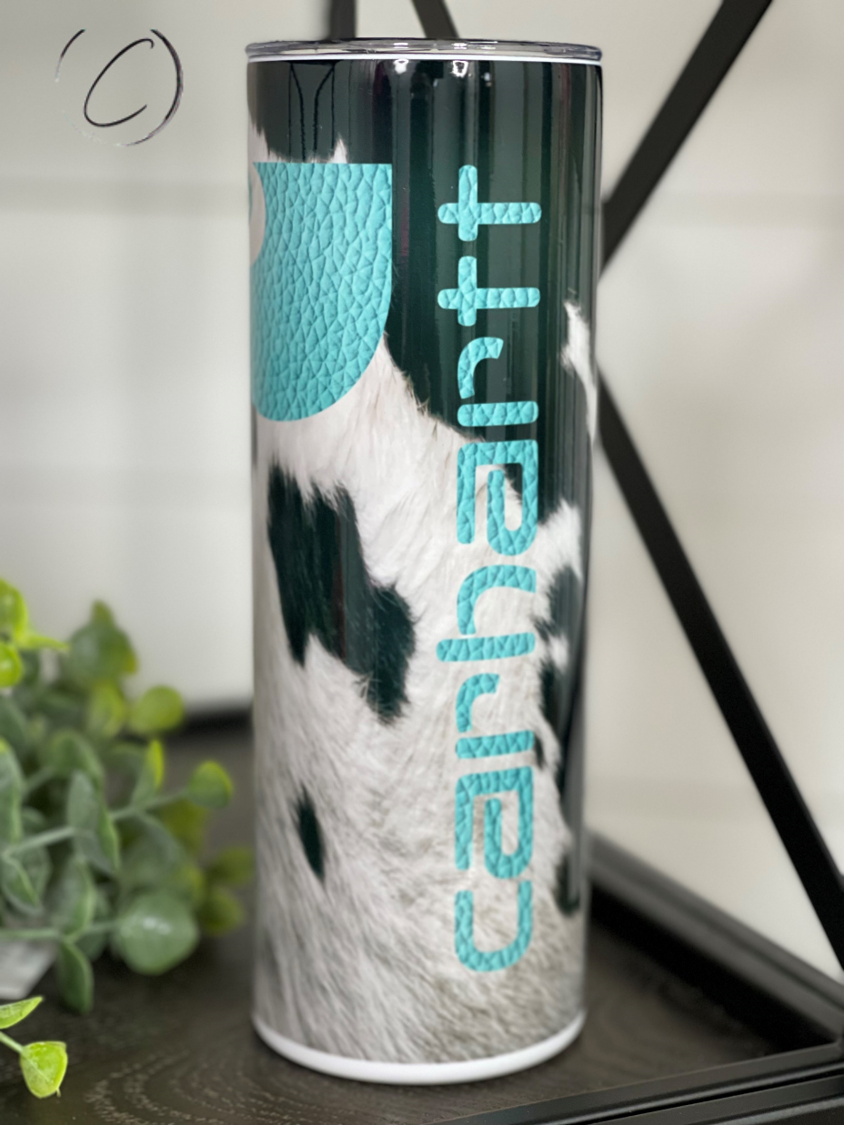 Teal Cowhide Carhartt 20oz Skinny Tumbler with reusable straw, showcasing a unique cowhide pattern.