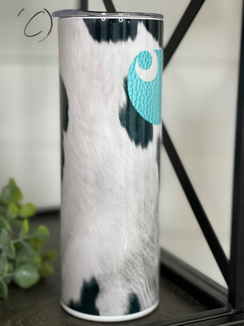 Teal Cowhide Carhartt 20oz Skinny Tumbler with reusable straw, showcasing a unique cowhide pattern.