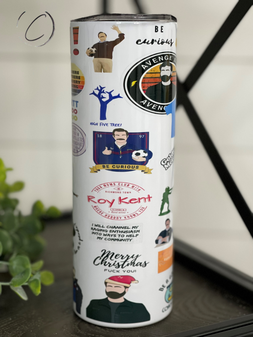 Ted Lasso 20oz Skinny Tumbler featuring a vibrant design, reusable straw, and insulated body for hot and cold beverages.
