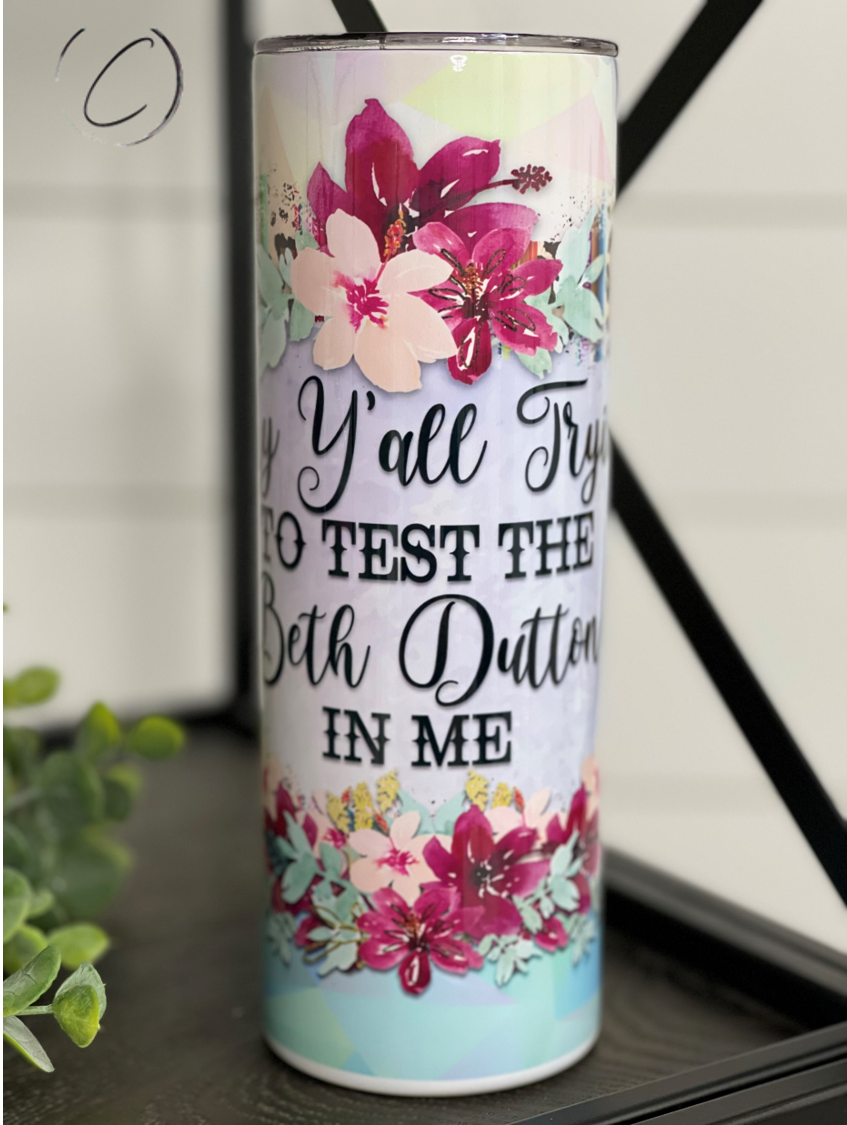 Test The Beth Dutton In Me 20oz Skinny Tumbler with a stylish full wrap design, perfect for hot and cold beverages.