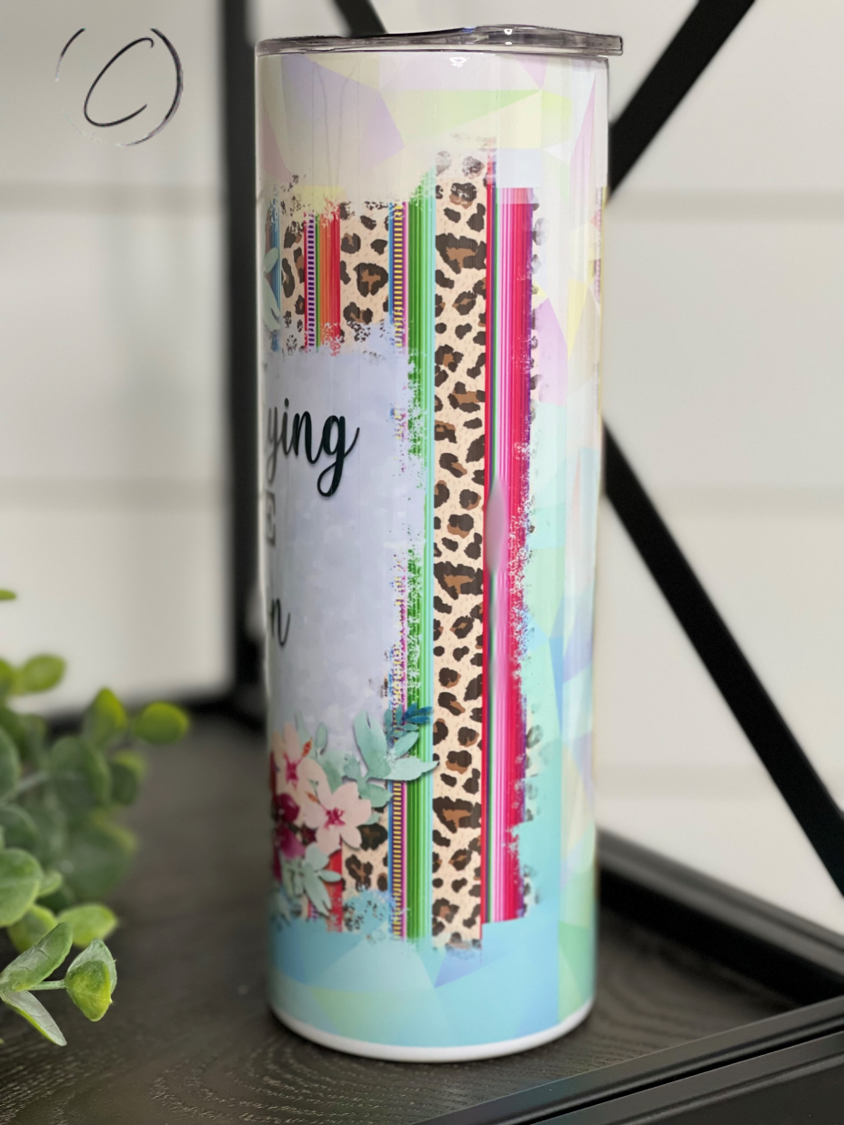 Test The Beth Dutton In Me 20oz Skinny Tumbler with a stylish full wrap design, perfect for hot and cold beverages.