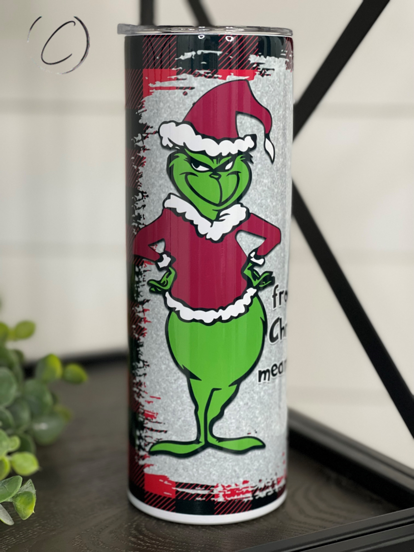 The Grinch Christmas Meaning 20oz Skinny Tumbler featuring a festive design, perfect for holiday beverages.