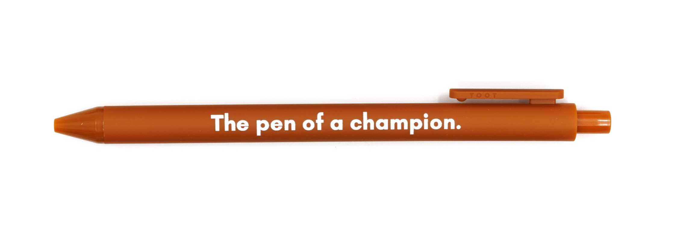 The Pen Of A Champion gel click pen in caramel color with a smooth matte barrel, ideal for gifting and stylish writing.