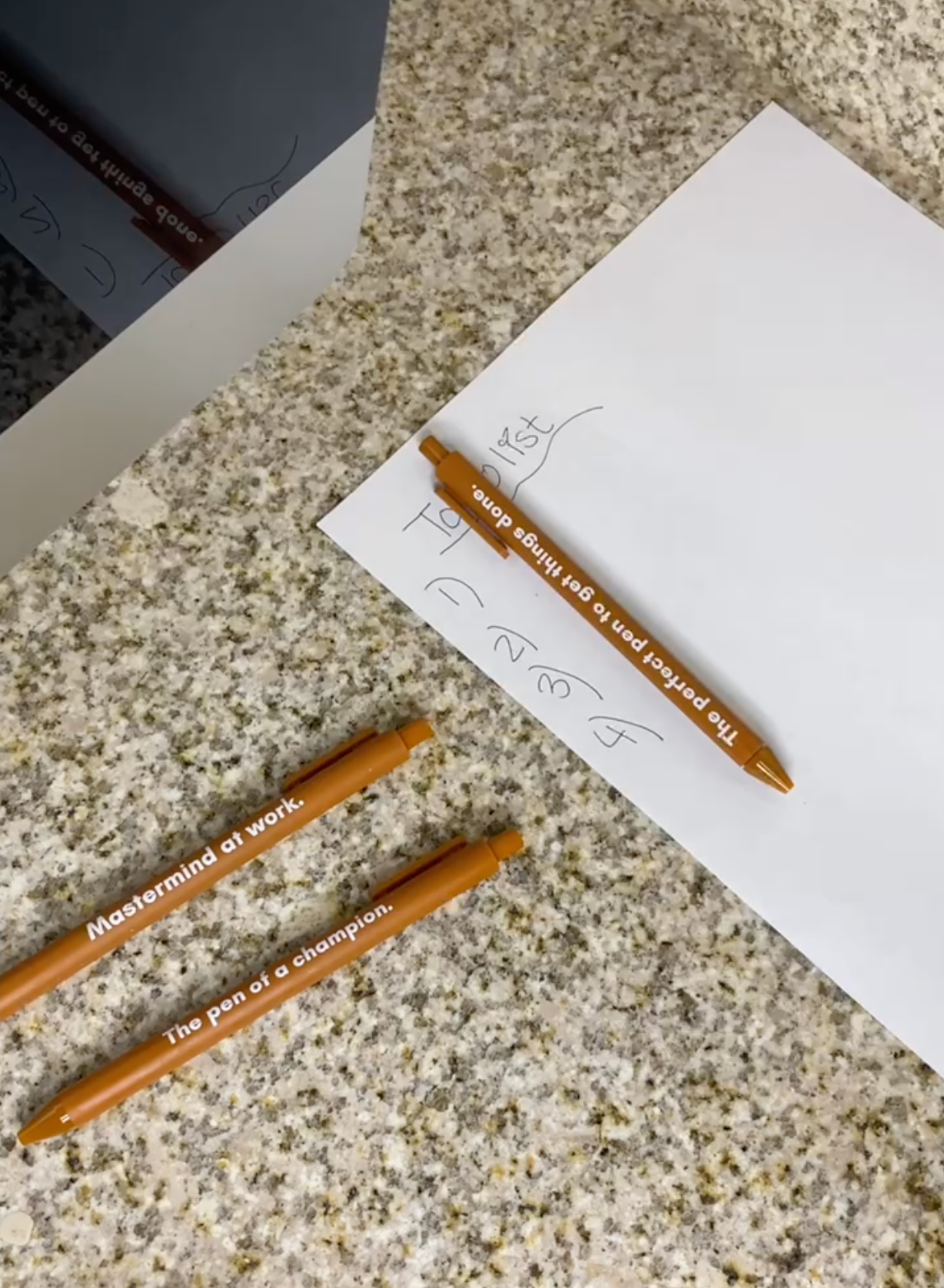 The Pen Of A Champion gel click pen in caramel color with a smooth matte barrel, ideal for gifting and stylish writing.