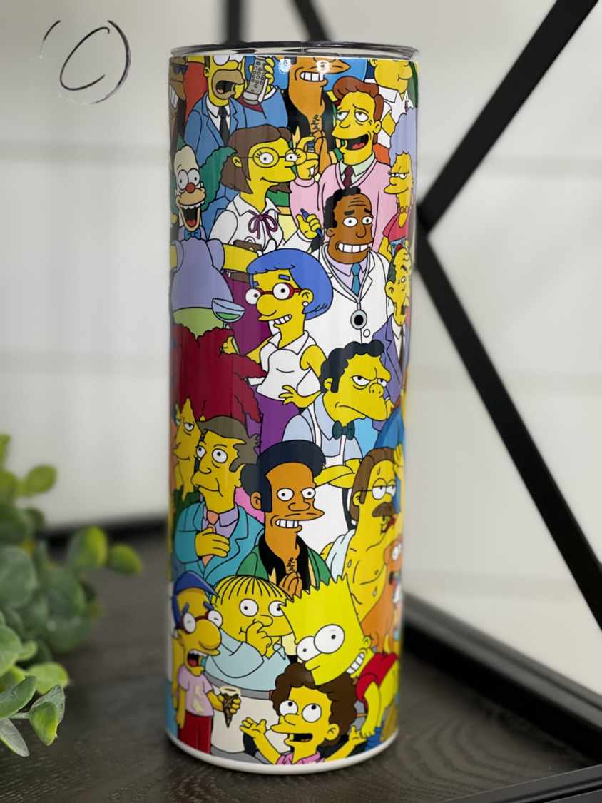 The Simpsons 20oz Skinny Tumbler featuring vibrant full wrap design with a reusable straw.