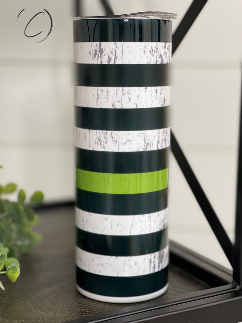 Thin Green Line 20oz Skinny Tumbler with a full wrap design, featuring a durable construction and a reusable straw.