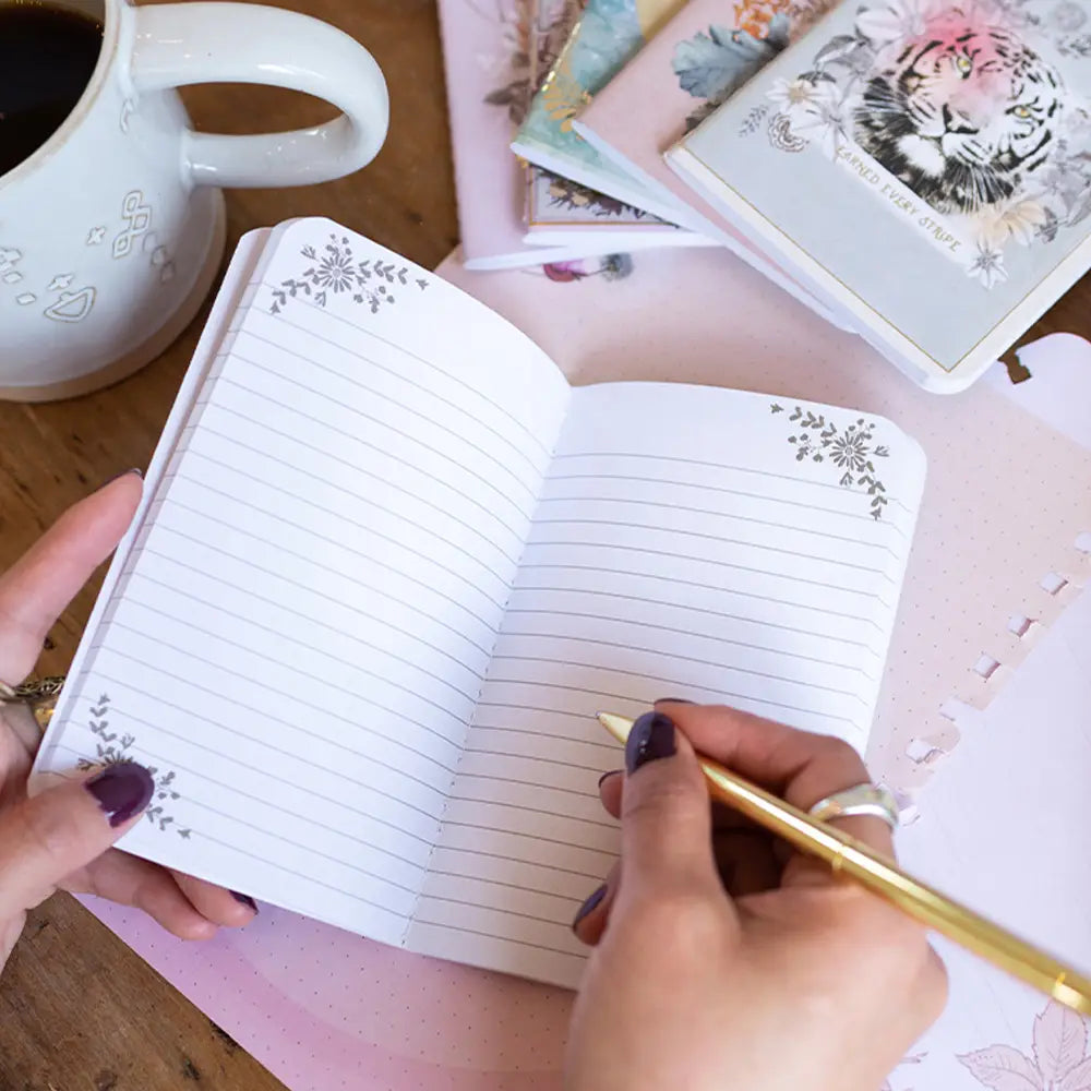 Tiger Roar Mini Book featuring a boho design with gold foil embellishments, saddle-stitched binding, and lined pages.