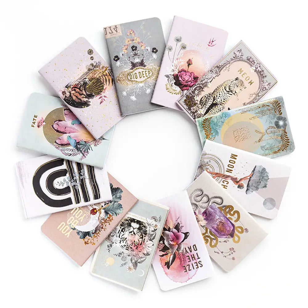 Tiger Roar Mini Book featuring a boho design with gold foil embellishments, saddle-stitched binding, and lined pages.