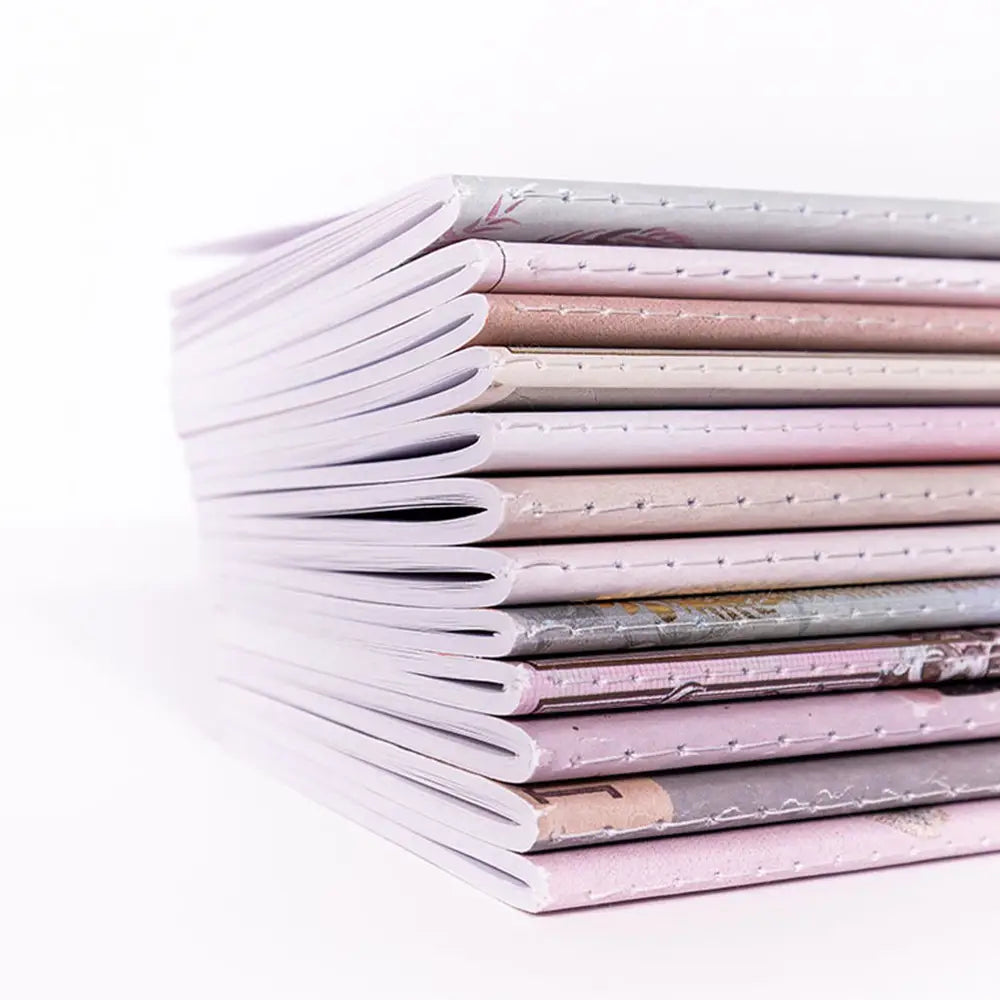 Tiger Roar Mini Book featuring a boho design with gold foil embellishments, saddle-stitched binding, and lined pages.