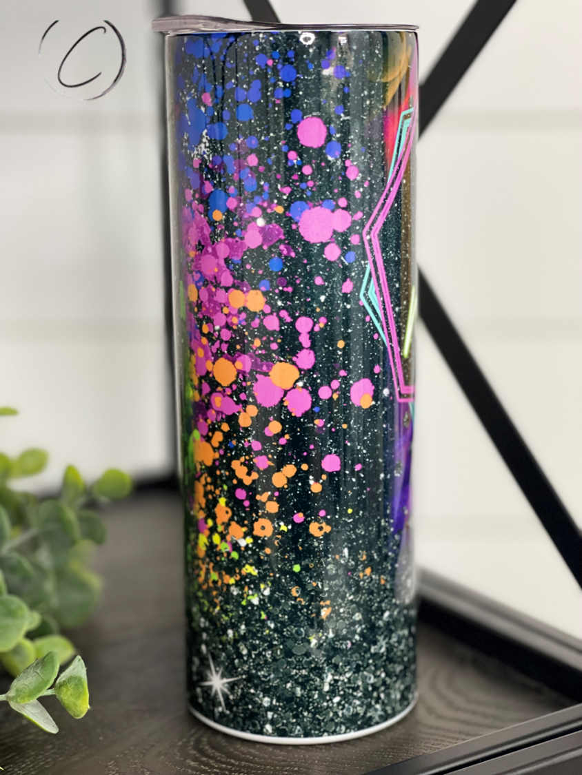 Tired As A Mother Splatter 20oz Skinny Tumbler with vibrant splatter design and reusable straw.