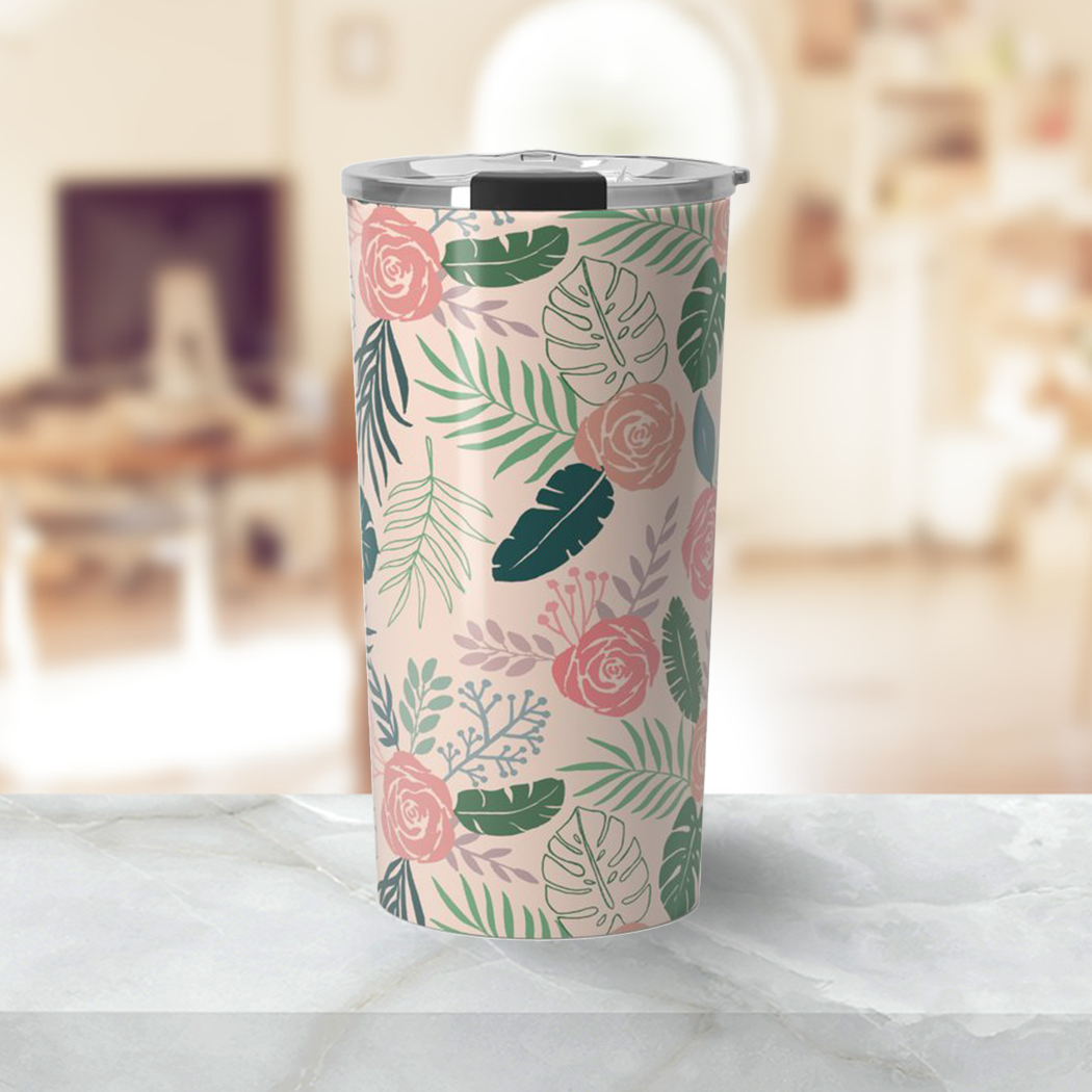 A vibrant Tropical Floral Travel Coffee Mug made of stainless steel, featuring a beautiful wraparound floral design and a vacuum-sealed lid.