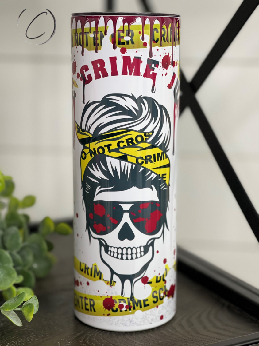 True Crime Junkie Messy Bun 20oz Skinny Tumbler featuring a stylish design perfect for true crime enthusiasts.