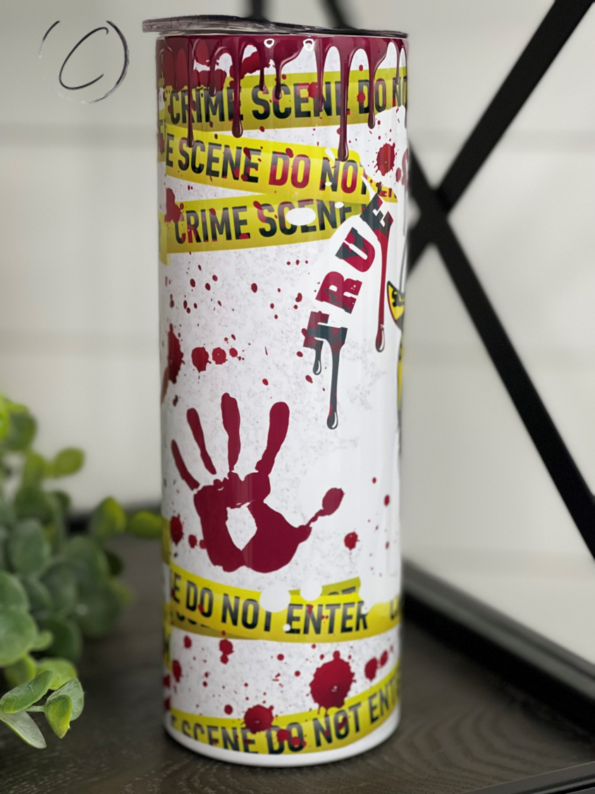 True Crime Junkie Messy Bun 20oz Skinny Tumbler featuring a stylish design perfect for true crime enthusiasts.