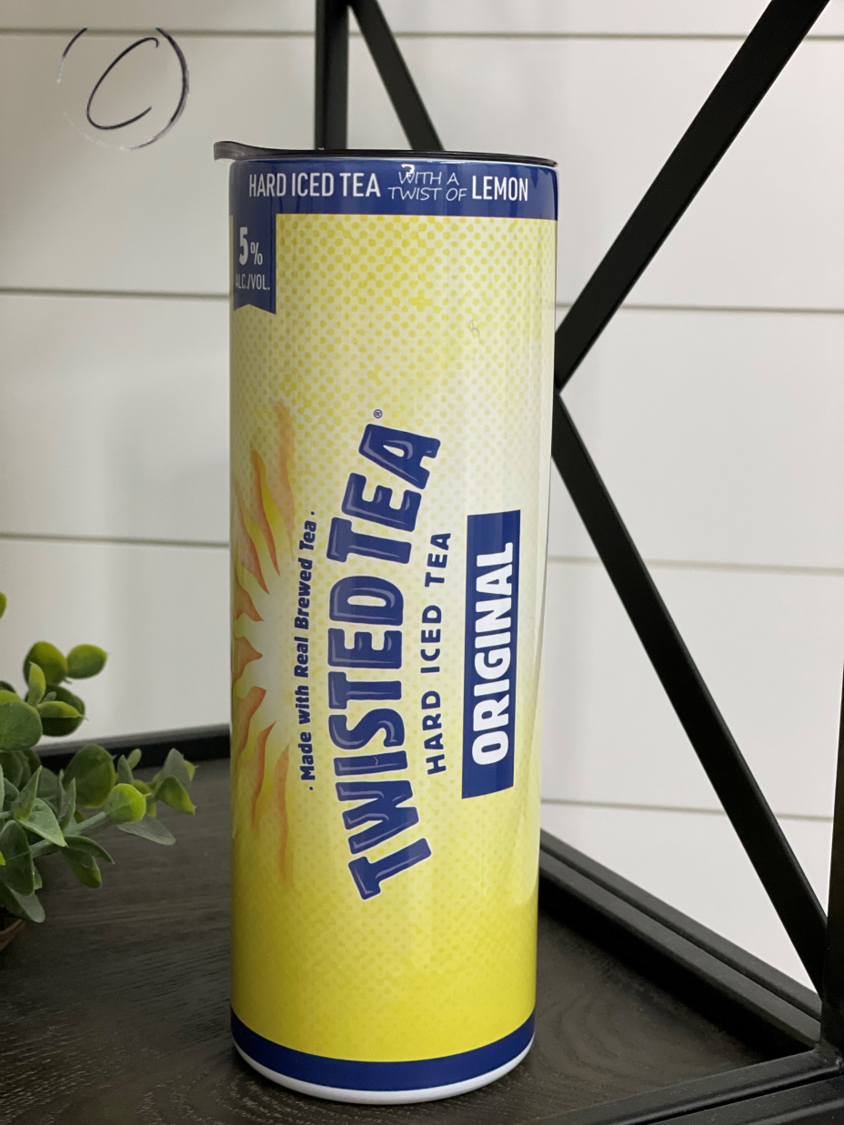 Twisted Tea 20oz Skinny Tumbler with a vibrant full wrap design, featuring a reusable straw.
