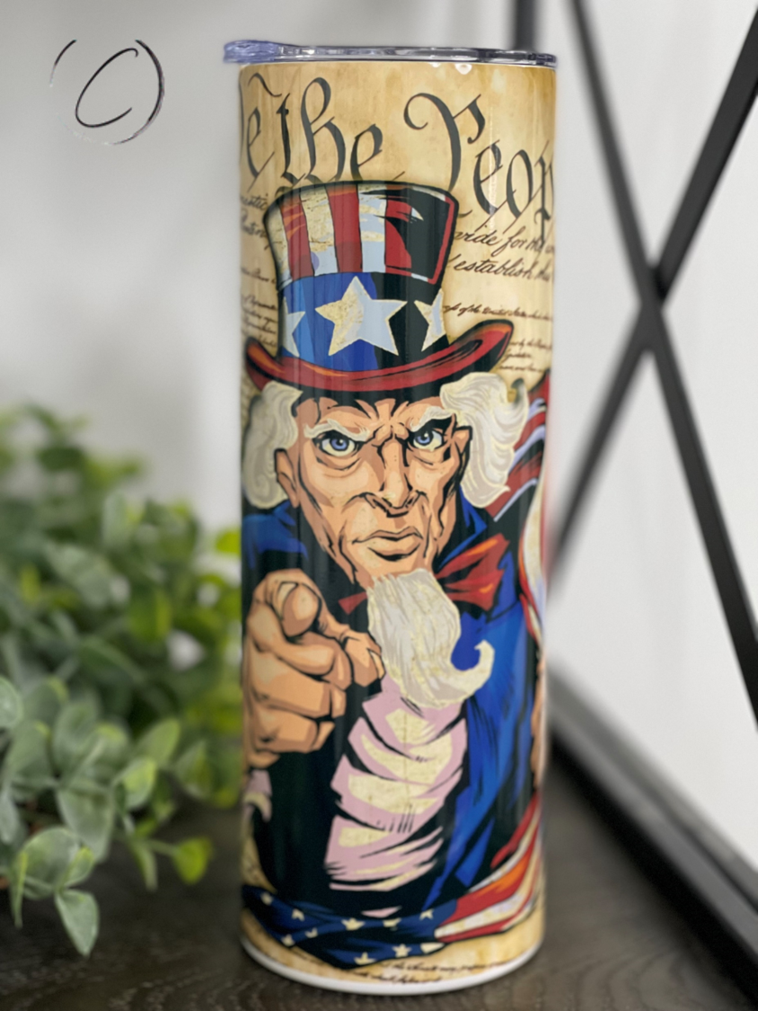 Uncle Sam We The People 20oz Skinny Tumbler with patriotic design and reusable straw.
